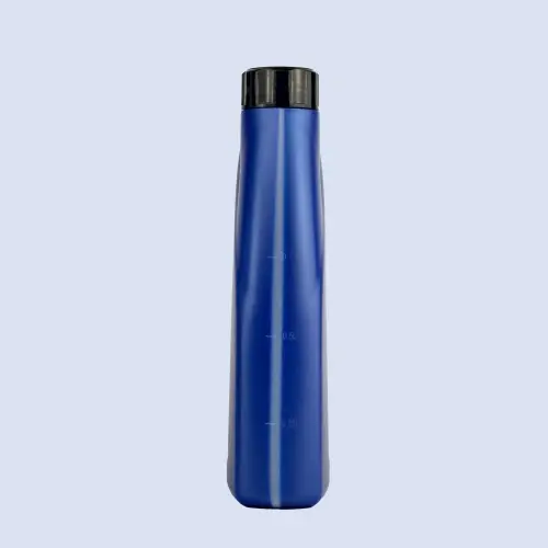 Side view of blue oil bottle with volume measurement markings