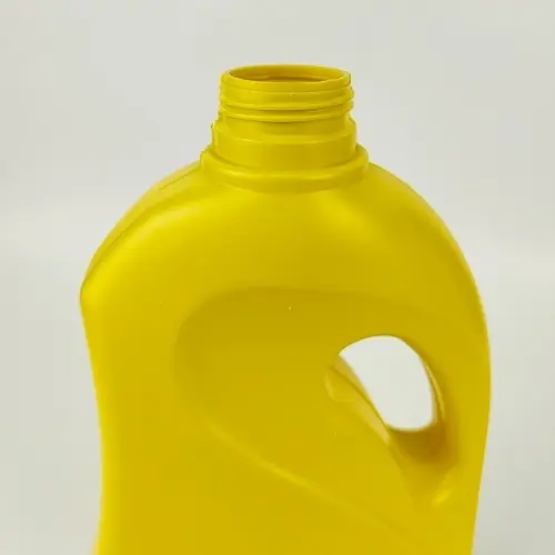 Close up of 1 liter engine oil bottle neck and threaded opening.