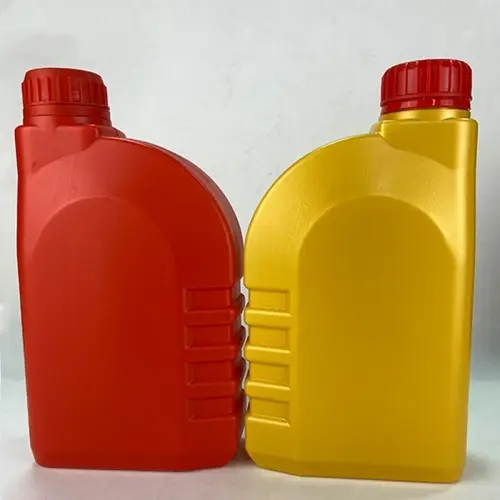 Red and yellow 1 liter engine oil measuring bottles for automotive lubricants.