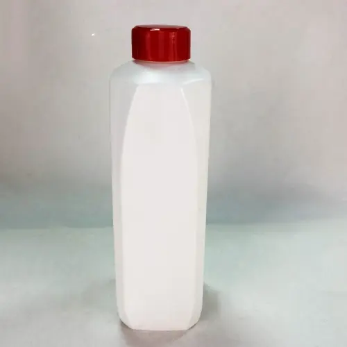 White square lubricant oil bottle with red screw cap front view