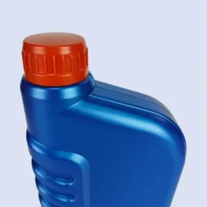 Close up view of blue HDPE lubricant bottle with red cap