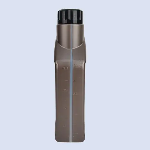 Front view of brown engine oil plastic bottle with molded volume measurement markings