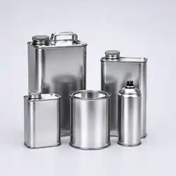 Industrial metal packaging containers including metal cans, tin containers, aerosol cans, and rectangular metal canisters on a clean background