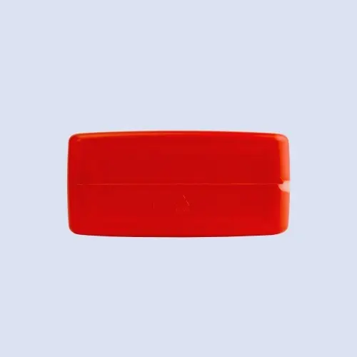 Bottom view of red HDPE motor oil bottle showing rectangular base and molded plastic construction