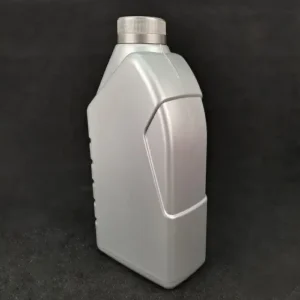 silver lubricant bottle angled view Angled view of silver HDPE lubricant bottle with molded grip design
