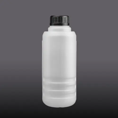 Side profile of white 2 liter plastic lubricant packaging bottle for automotive oils.