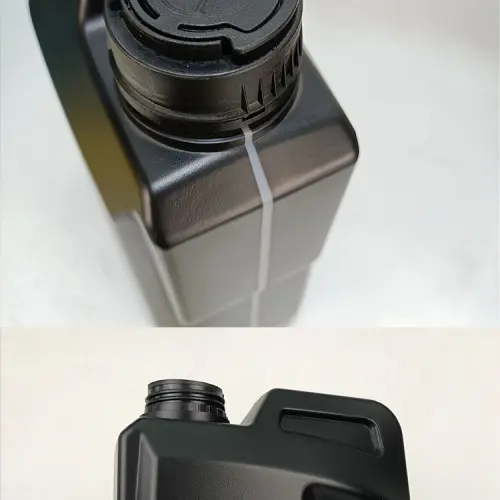 Close-up of the neck and tamper evident cap on a 4 liter black HDPE plastic engine oil bottle for secure lubricant packaging.