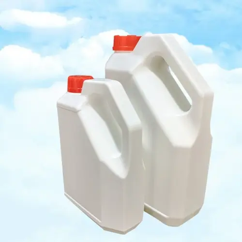 White HDPE plastic engine oil bottles in two different capacities for automotive lubricant packaging.