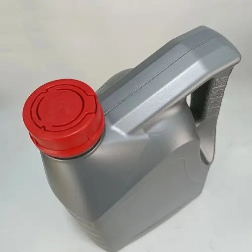 Top angle of a 4 liter HDPE engine oil bottle featuring a secure tamper evident cap and ergonomic handle.